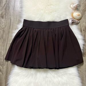 TNA Aritzia pleated tennis skirt, brown size small